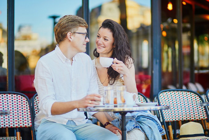 man and woman cafe in Paris
